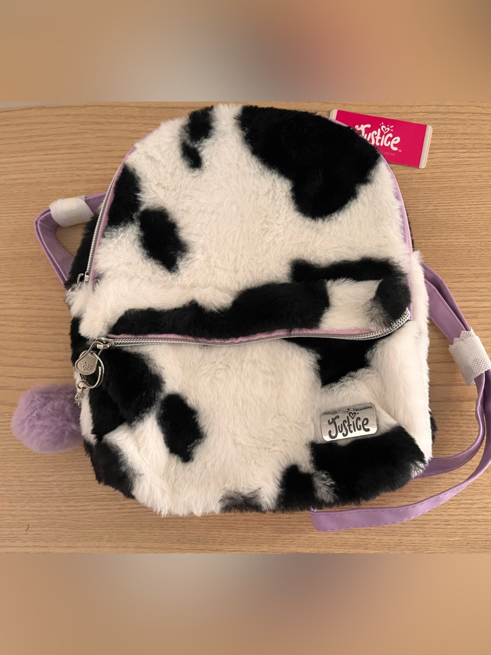 Faux Fur Cow Print Mini Backpack Bag Purple Straps and Pom Pom Keychain NWT